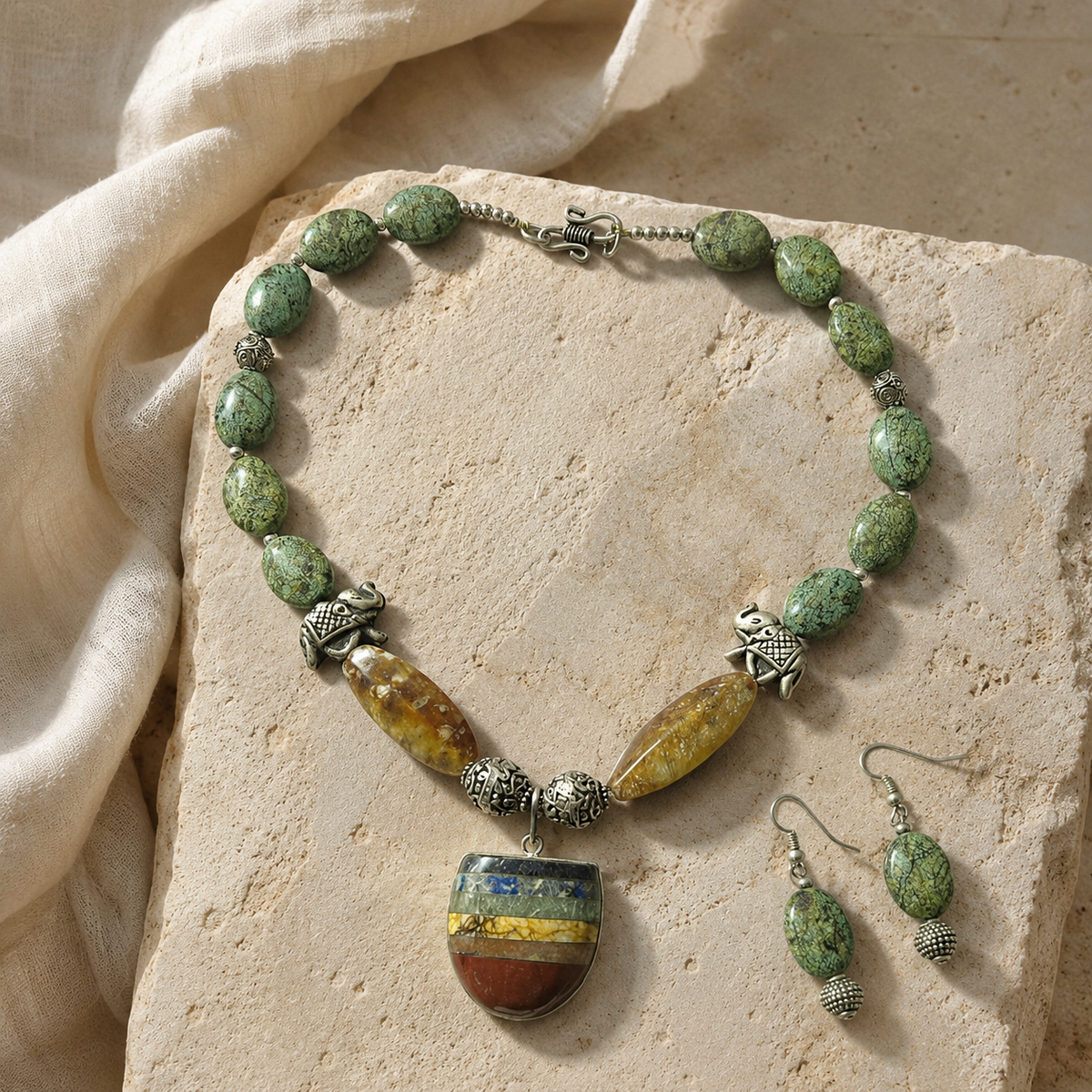 Green Elephant Pendant Statement Set worn by a model in an alternate view