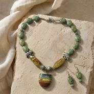 Green Elephant Pendant Statement Set worn by a model in an alternate view