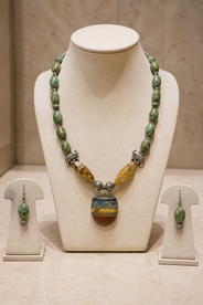 Green Elephant Pendant Statement Set in an alternate flat lay