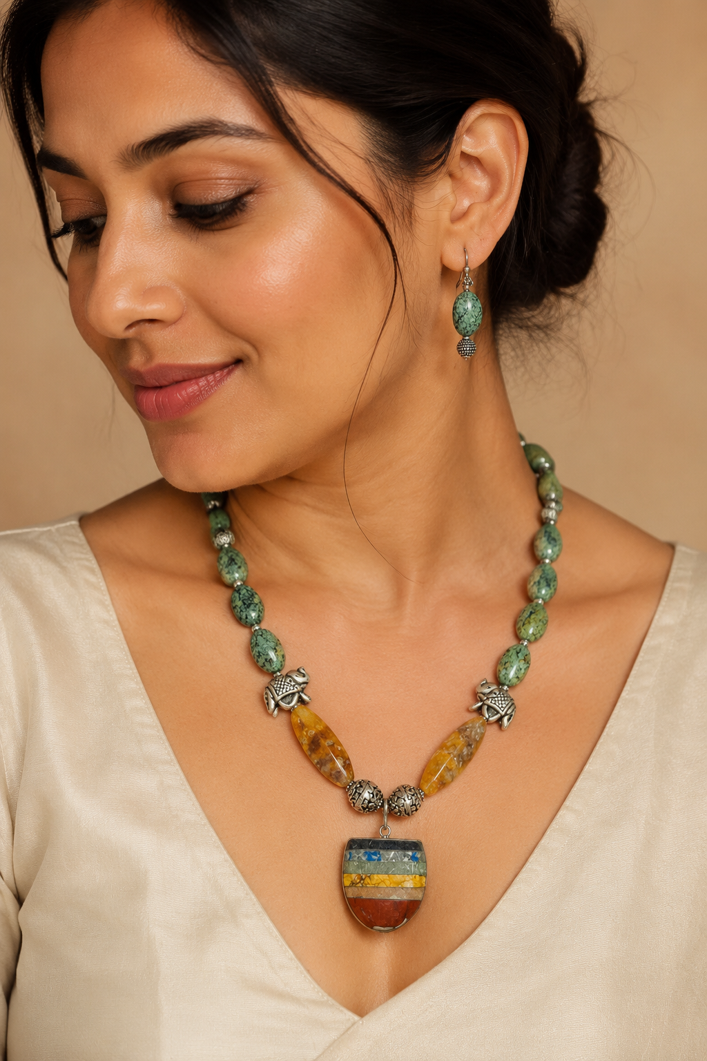 Green Elephant Pendant Statement Set in a stone and bead detail view