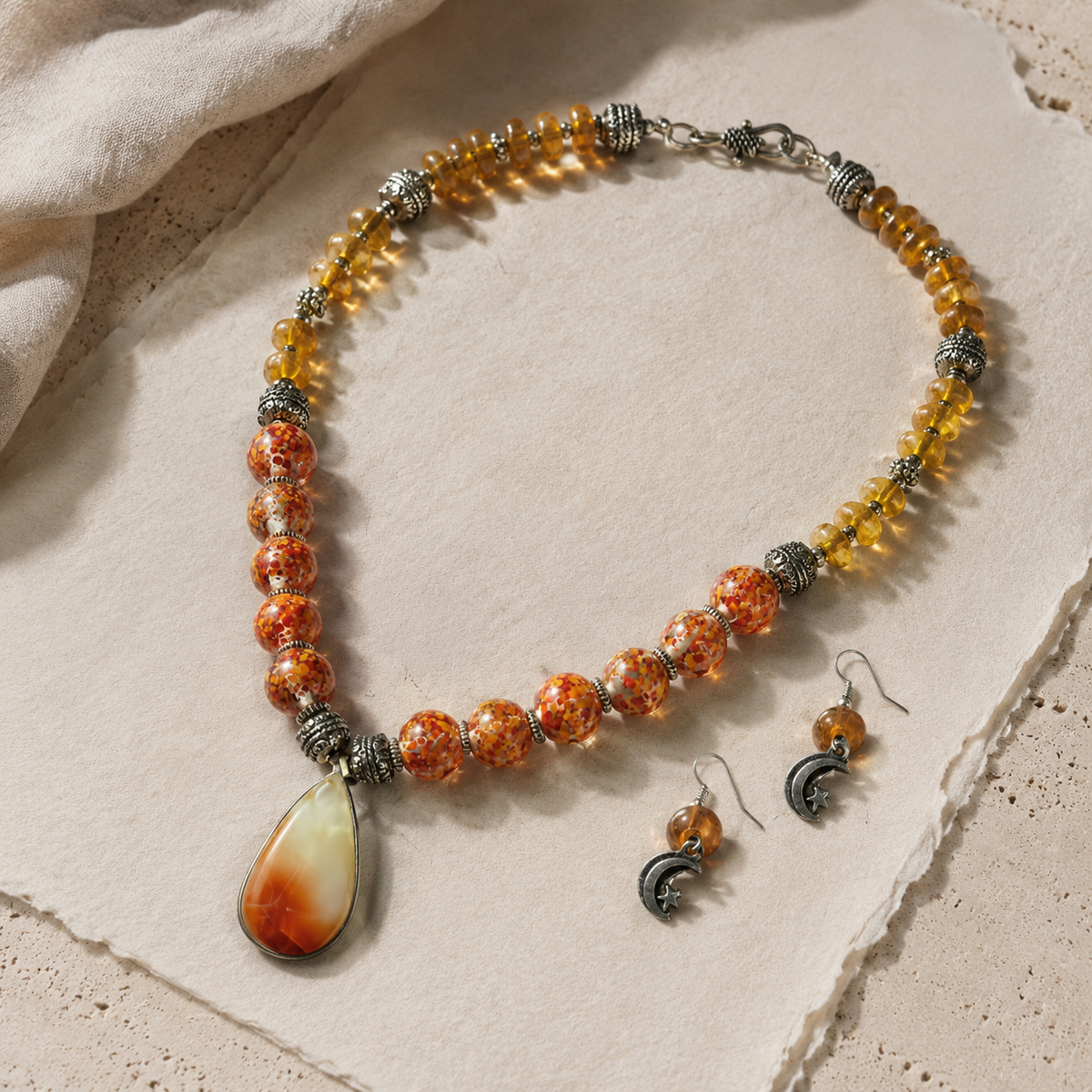Orange Sunset Agate Pendant Set worn by a model in an alternate view
