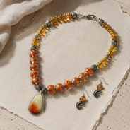 Orange Sunset Agate Pendant Set worn by a model in an alternate view