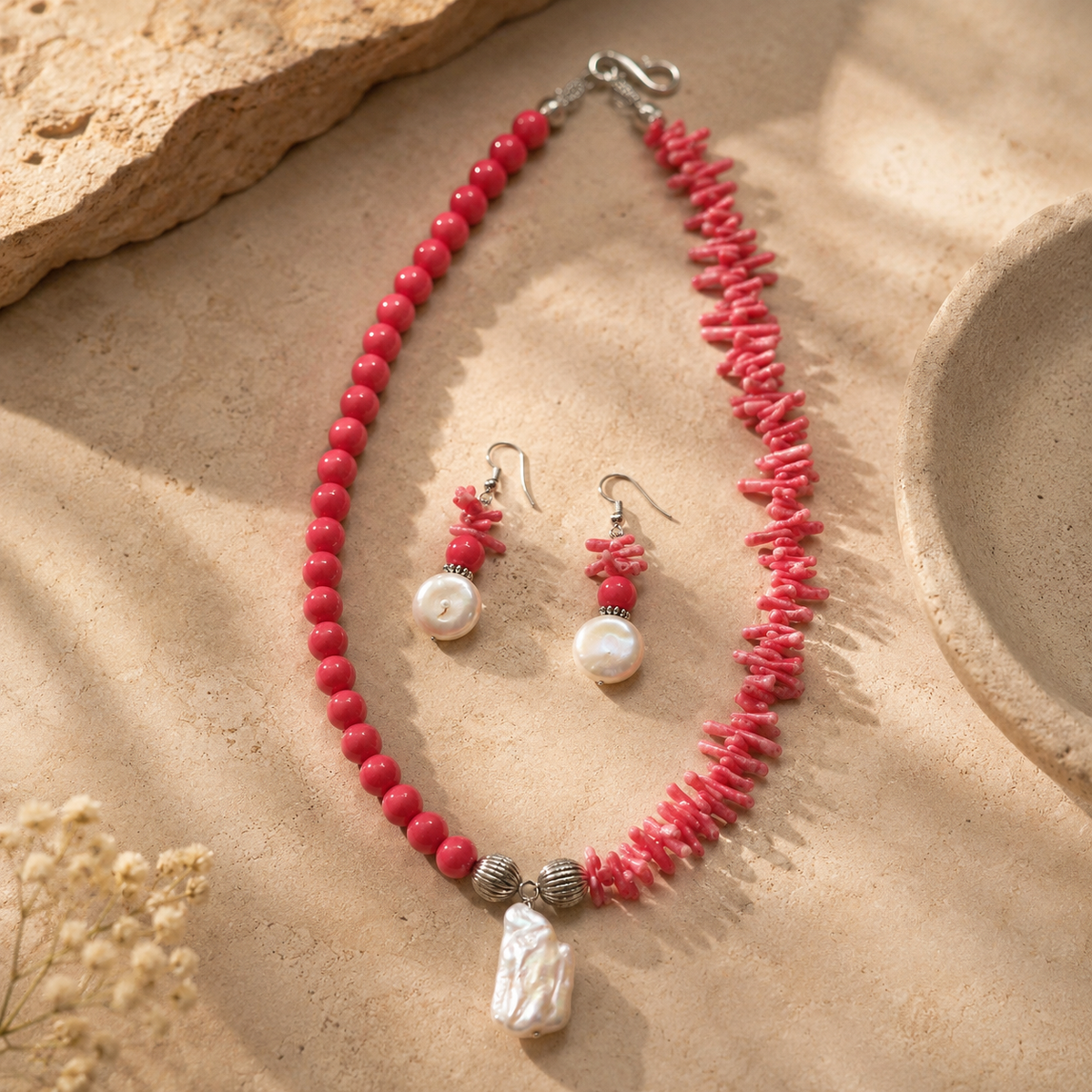 Close-up of Coral Pearl Asymmetric Statement Set showing pendant and finishing details