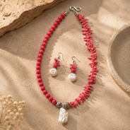 Close-up of Coral Pearl Asymmetric Statement Set showing pendant and finishing details