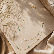 Additional styling view of Aqua Pearl Double-Strand Wire Necklace by Pathrohi