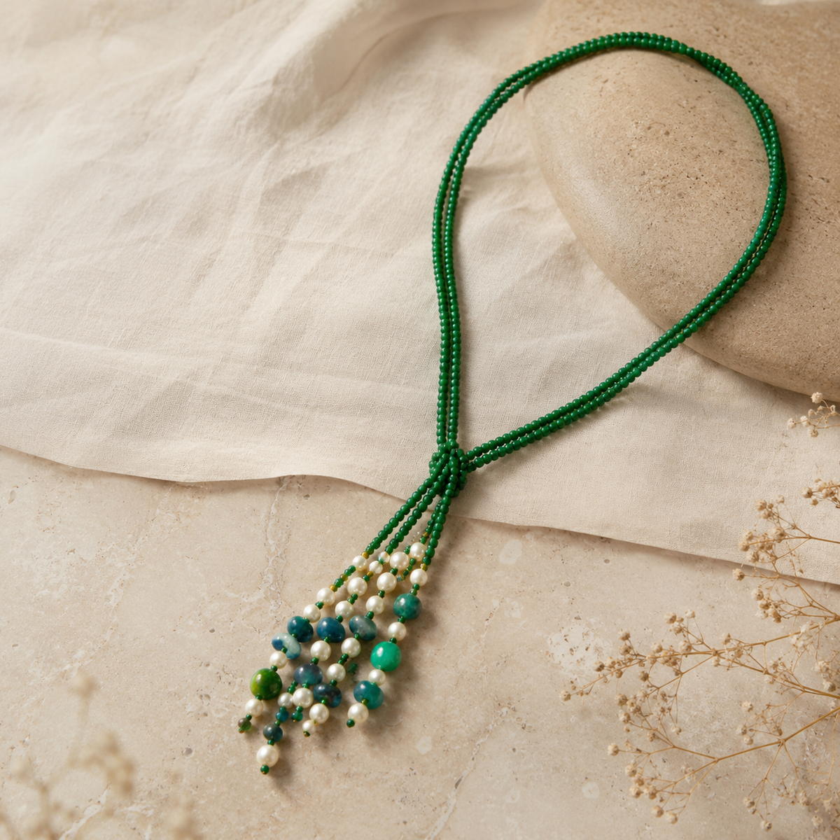 Close-up of Green Agate Cascade Tassel Necklace showing pendant and finishing details