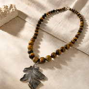 Detailed view of Tiger Eye Leaf Pendant Necklace showing stone and bead arrangement