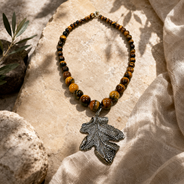 Close-up of Tiger Eye Leaf Pendant Necklace showing pendant and finishing details