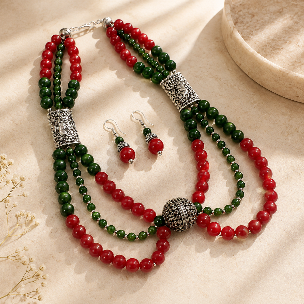Close-up view of Ruby Green Multi-Layer Statement Set showing handcrafted details