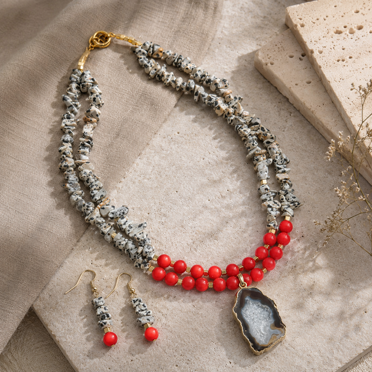 Angled view of Scarlet Speckled Agate Slice Necklace Set handcrafted by Pathrohi