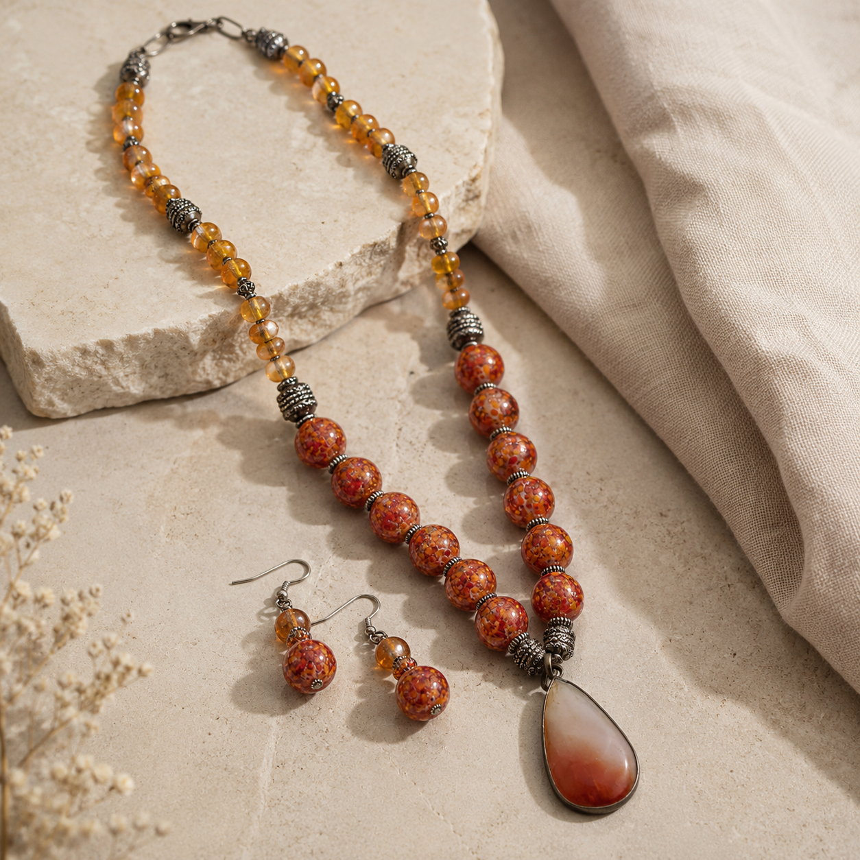 Front view of Orange Sunset Agate Pendant Set handcrafted by Pathrohi