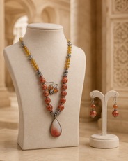 Close-up view of Orange Sunset Agate Pendant Set showing handcrafted details
