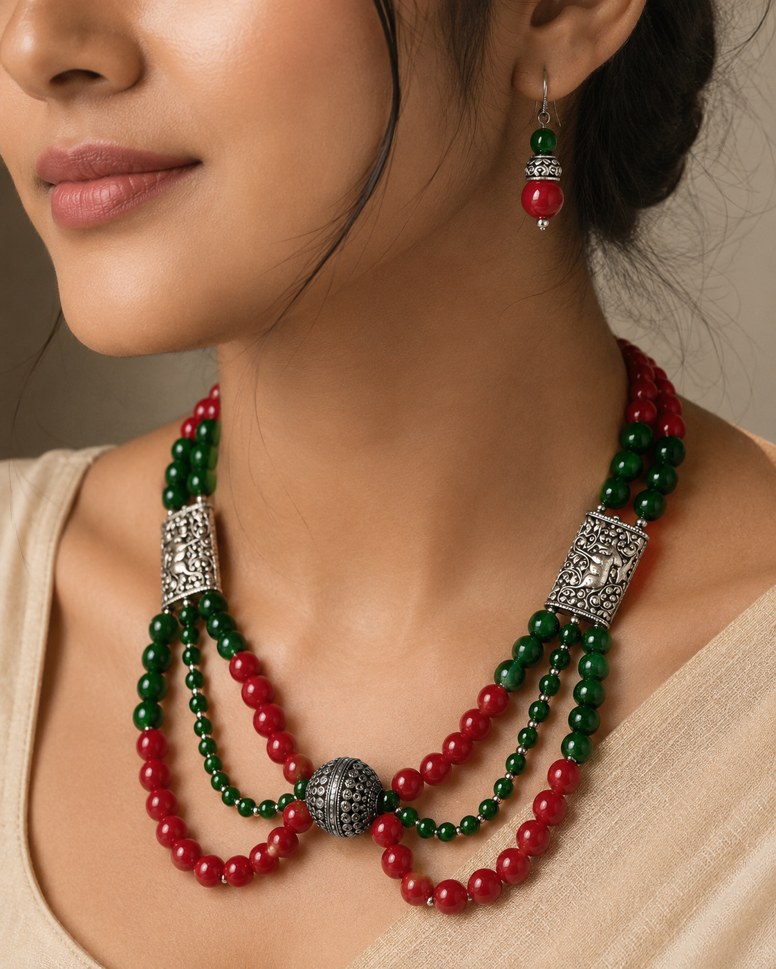 Angled view of Ruby Green Multi-Layer Statement Set handcrafted by Pathrohi