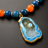 Detailed view of Cobalt Blue Agate Slice Pendant Necklace showing stone and bead arrangement