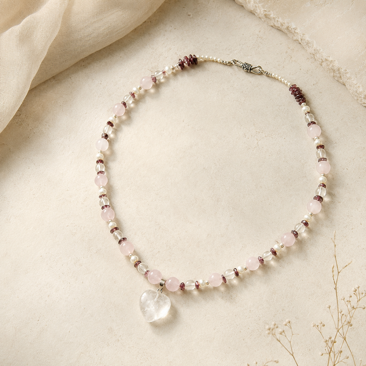 Angled view of Blush Agate Heart Pendant Necklace handcrafted by Pathrohi