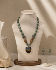 Close-up view of Green Elephant Pendant Statement Set showing handcrafted details
