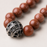 Close-up view of Brown Oxidised Goldstone Necklace showing handcrafted details