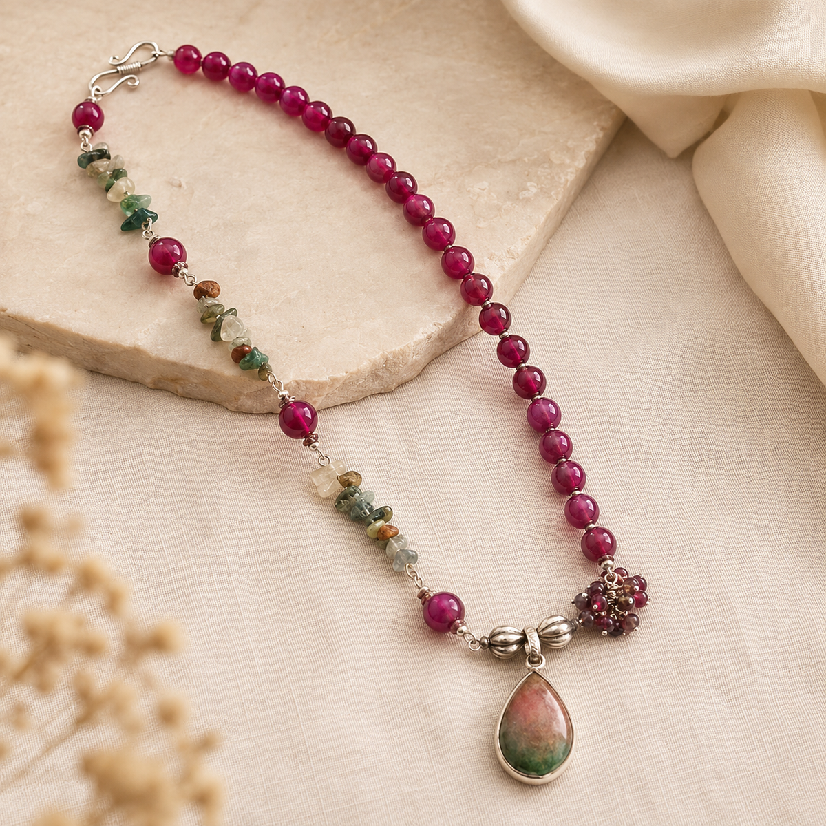 Angled view of Fuchsia Garden Agate Pendant Necklace handcrafted by Pathrohi