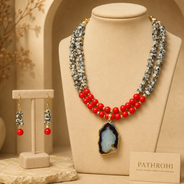Full view of Scarlet Speckled Agate Slice Necklace Set showing necklace proportions