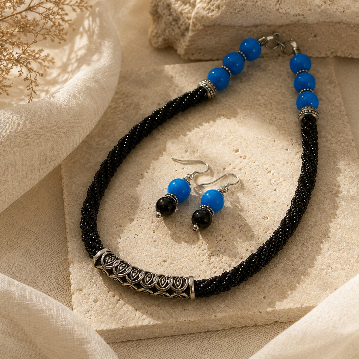 Close-up of Azure Noir Oxidised Tube Necklace Set showing pendant and finishing details