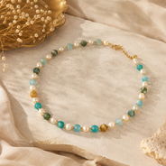 Angled view of Aqua Agate & Semi-Cultured Pearl Beaded Necklace handcrafted by Pathrohi