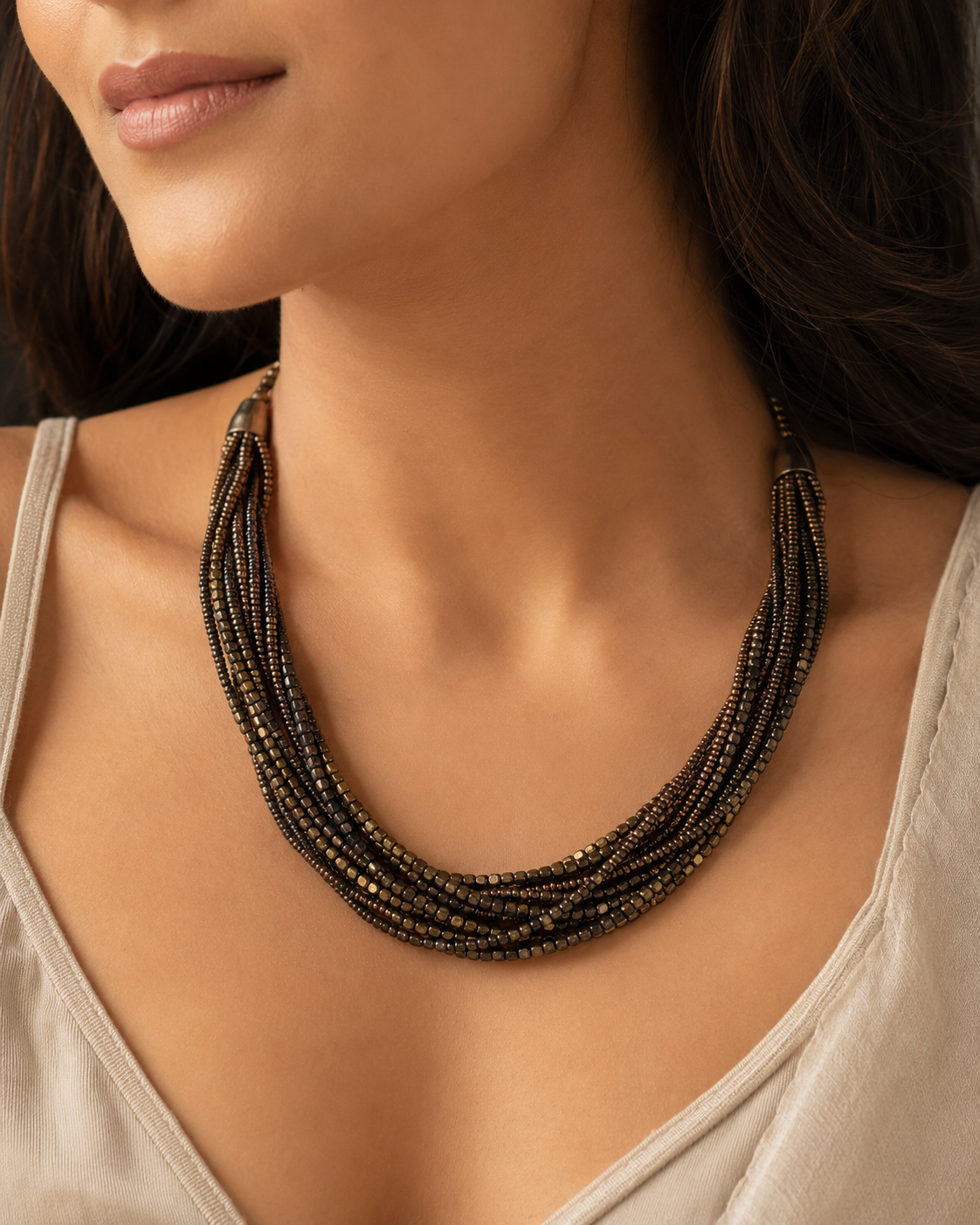 Angled view of Antique Bronze Multi-Strand Collar Set handcrafted by Pathrohi
