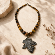 Front view of Tiger Eye Leaf Pendant Necklace handcrafted by Pathrohi