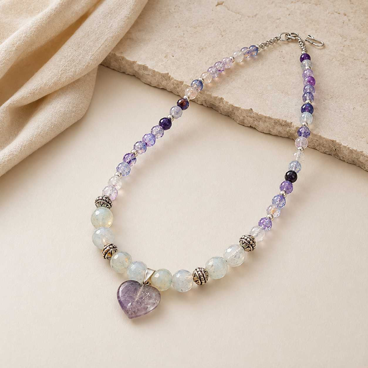 Angled view of Amethyst Moon Heart Pendant Necklace handcrafted by Pathrohi