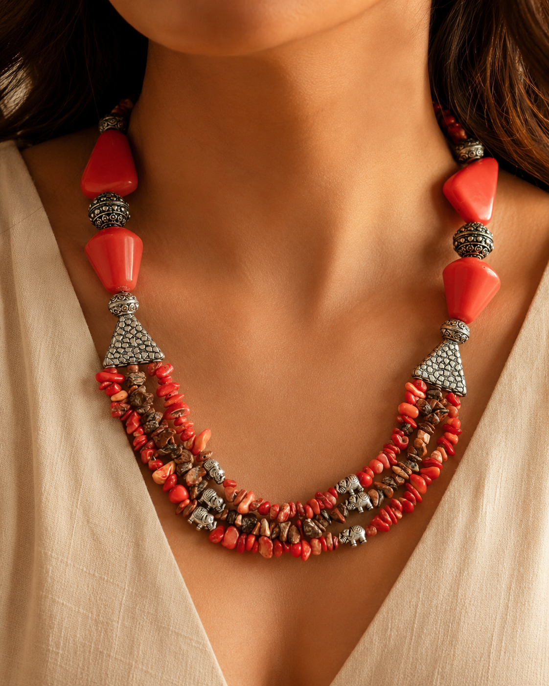 Close-up of Coral Agate Elephant Multi-Strand Necklace showing pendant and finishing details