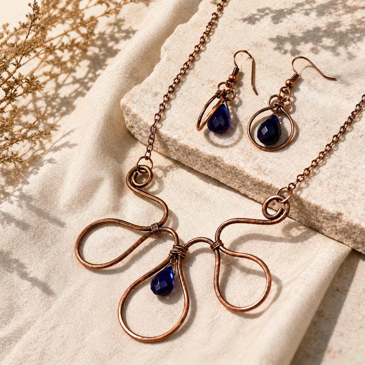 Angled view of Copper Bloom Wire Statement Set handcrafted by Pathrohi