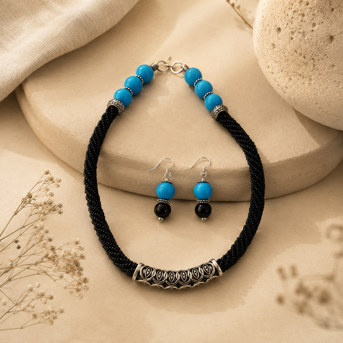 Detailed view of Azure Noir Oxidised Tube Necklace Set showing stone and bead arrangement