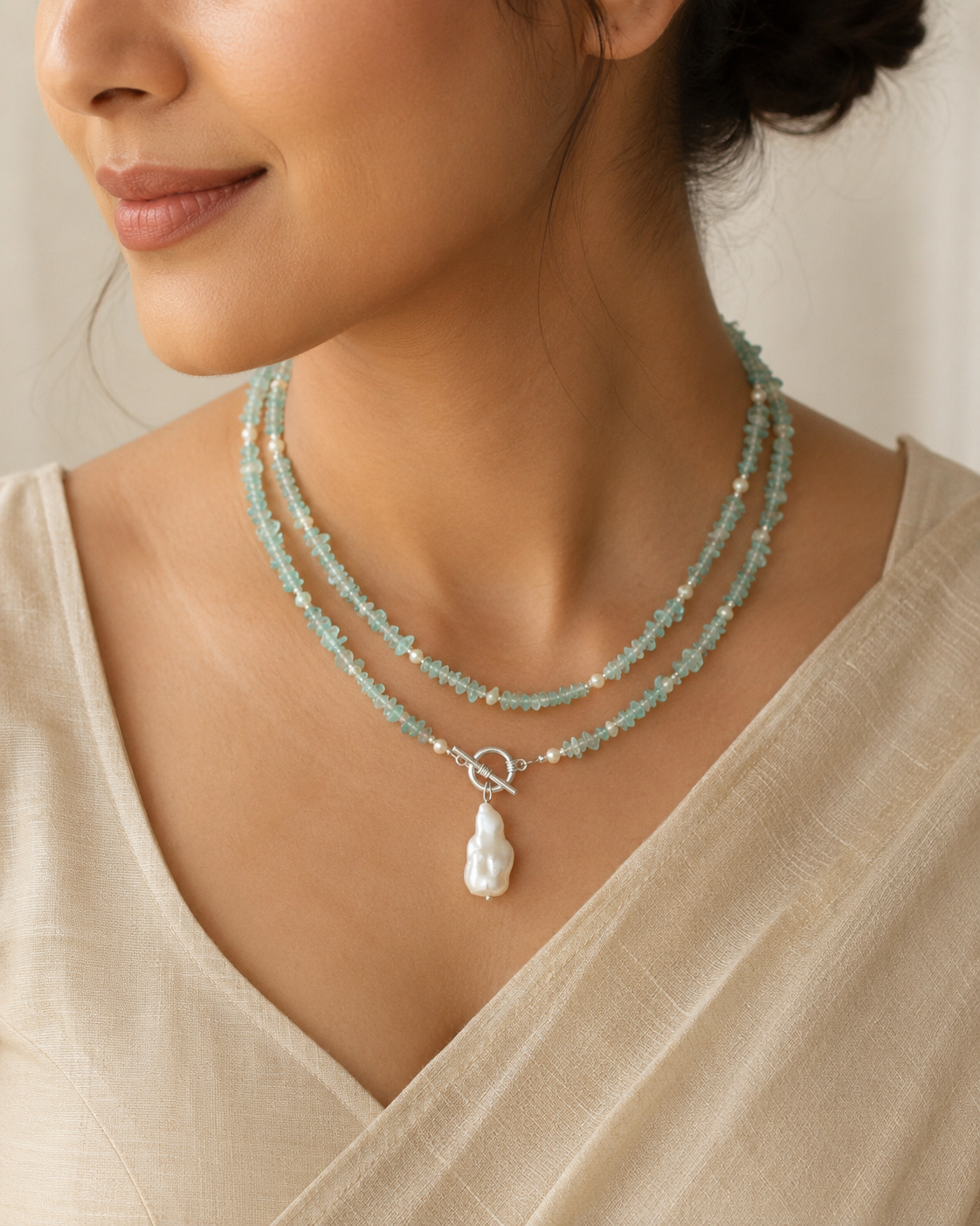 Close-up of Aqua Agate & Semi-Cultured Pearl Double-Strand Drop Necklace showing pendant and finishing details