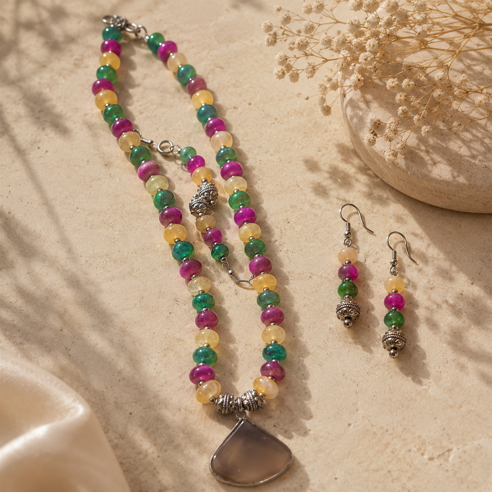 Front view of Multicolour Chakra Fan Pendant Set handcrafted by Pathrohi