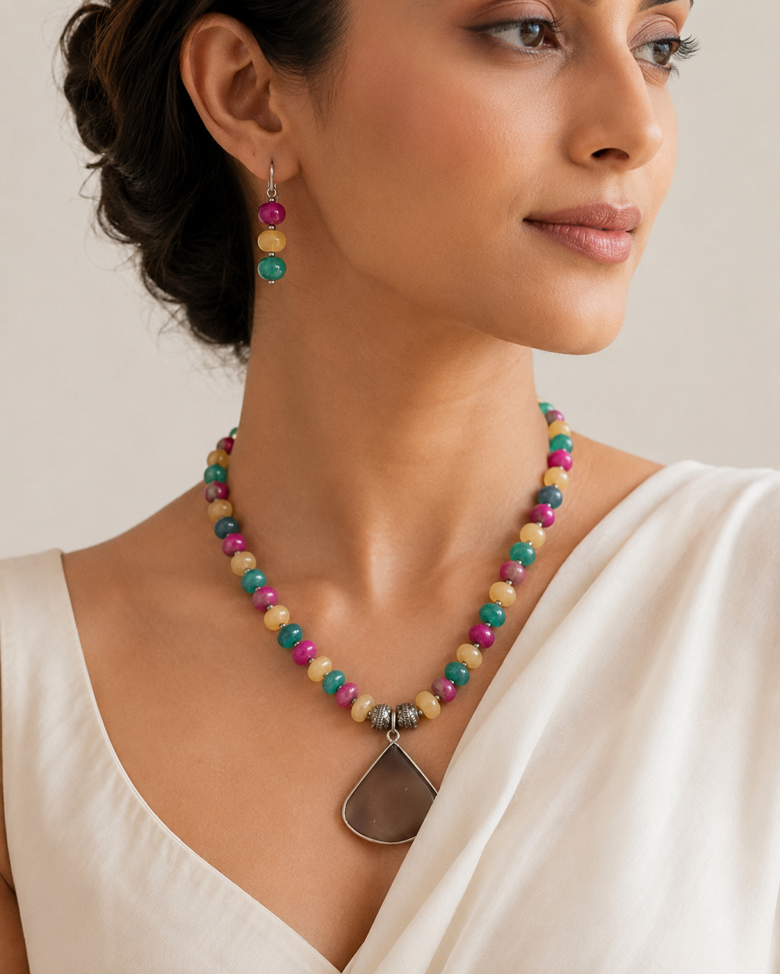 Full view of Multicolour Chakra Fan Pendant Set showing necklace proportions