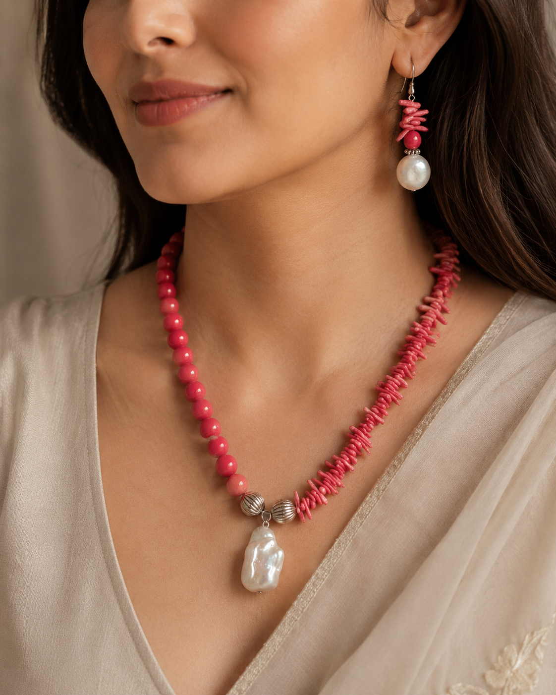 Detailed view of Coral Pearl Asymmetric Statement Set showing stone and bead arrangement