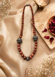 Close-up of Brown Oxidised Goldstone Necklace showing pendant and finishing details