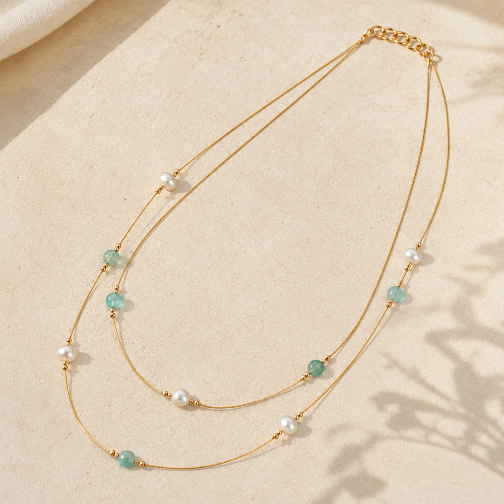 Angled view of Aqua Pearl Double-Strand Wire Necklace handcrafted by Pathrohi