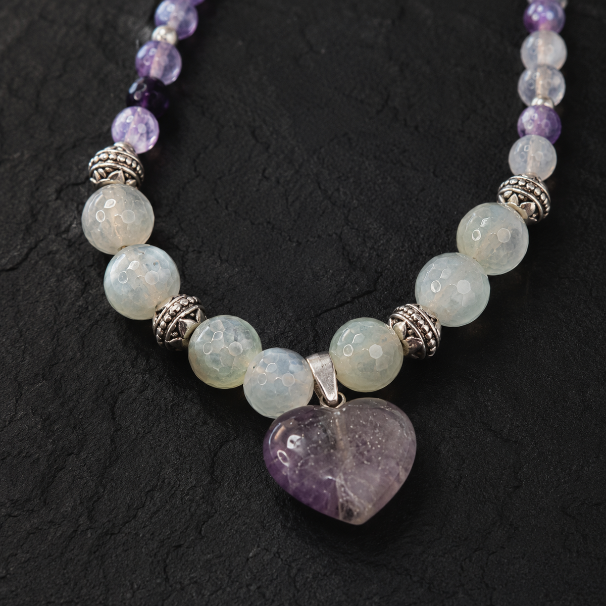 Detailed view of Amethyst Moon Heart Pendant Necklace showing stone and bead arrangement
