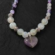 Detailed view of Amethyst Moon Heart Pendant Necklace showing stone and bead arrangement