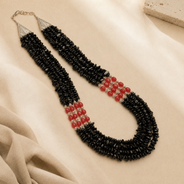 Angled view of Black & Red Agate Three-Layer Necklace handcrafted by Pathrohi