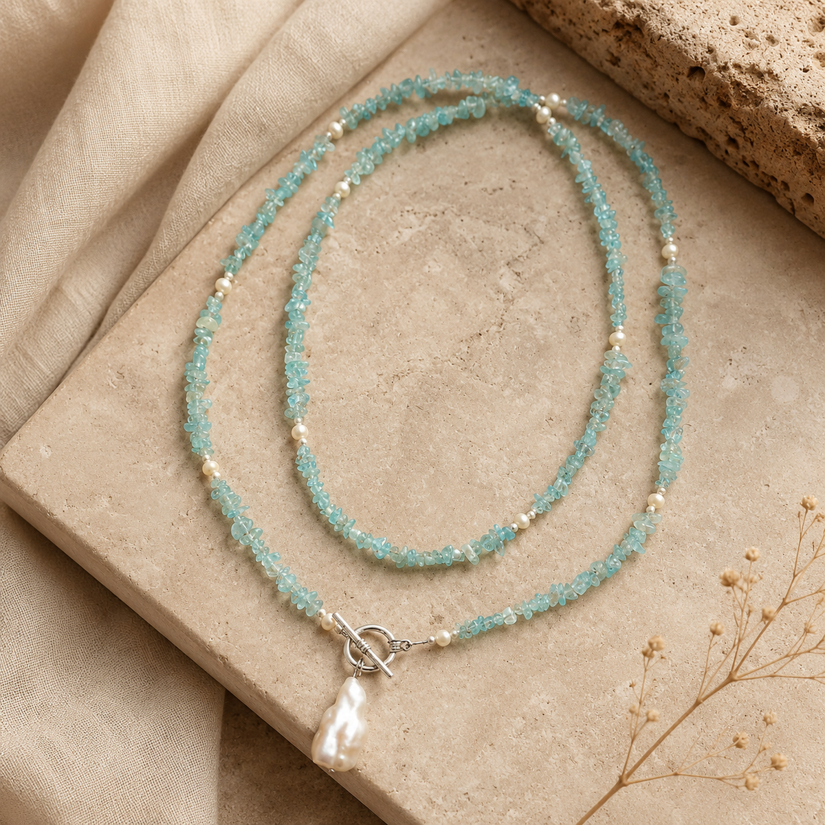 Angled view of Aqua Agate & Semi-Cultured Pearl Double-Strand Drop Necklace handcrafted by Pathrohi