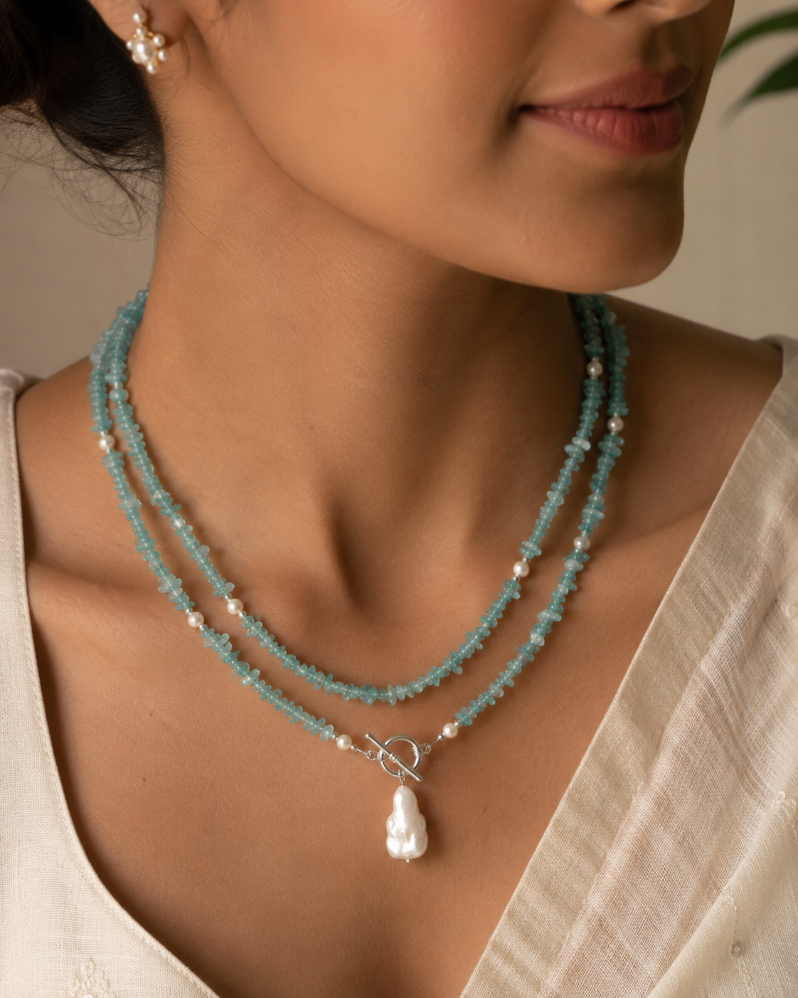 Additional styling view of Aqua Agate & Semi-Cultured Pearl Double-Strand Drop Necklace by Pathrohi