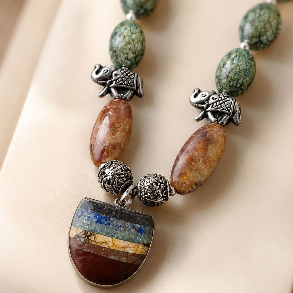 Front view of Green Elephant Pendant Statement Set handcrafted by Pathrohi