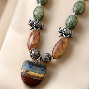 Front view of Green Elephant Pendant Statement Set handcrafted by Pathrohi